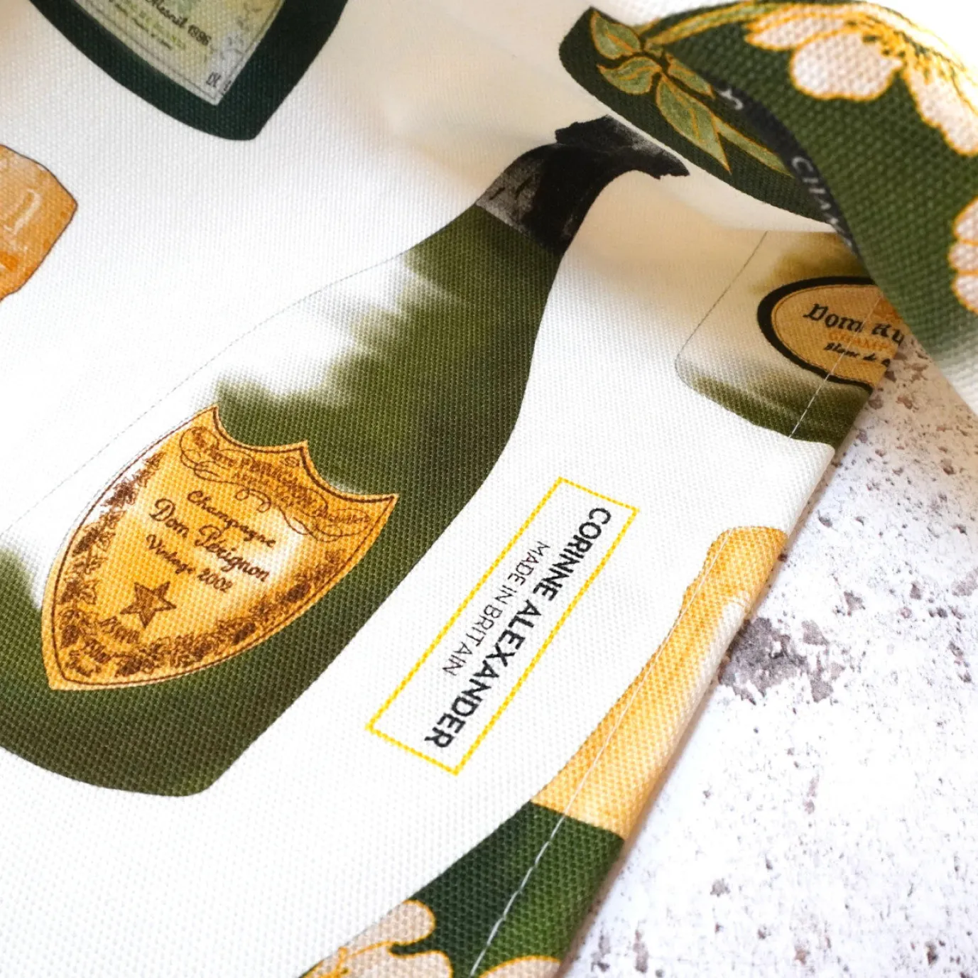 Champagne Tea Towel by Corinne Alexander